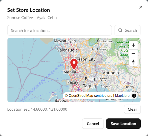 The Set Store Location dialog: the store name below the title, a search box, a map zoomed to a city with a red pin dropped on the store's spot, the pin's coordinates, and Cancel / Save Location buttons